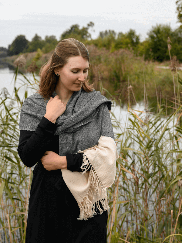 Conscious consumer wrapped in a sustainable shawl instead of wearing plastic