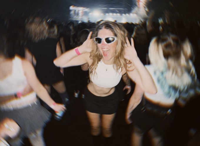 Girl wearing versatile eco-friendly clothing at a festival
