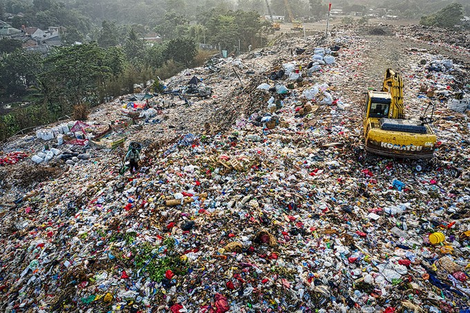 Landfill full of fast fashion clothes