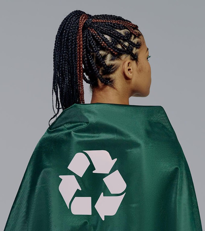 Model wearing a garment symbolising recycling in the fashion industry