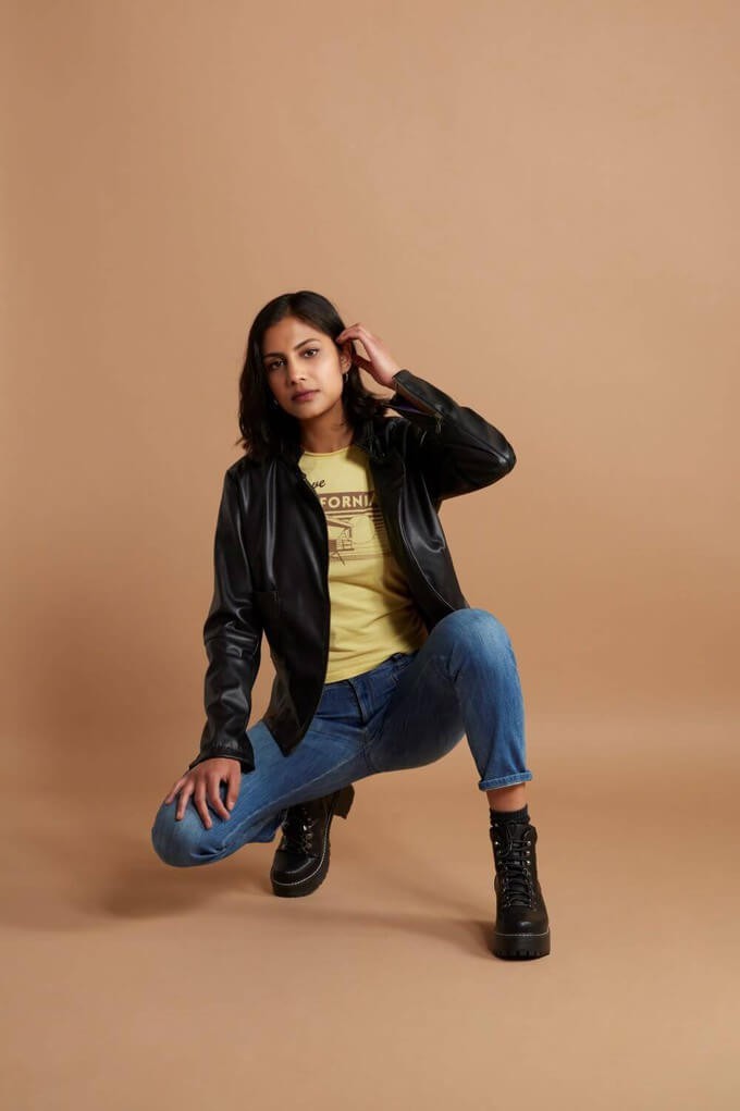 Model wearing a vegan leather jacket