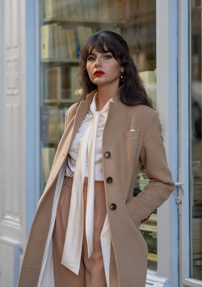 outfit layering ideas with a slightly open coat