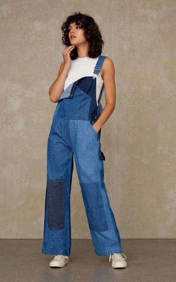Sustainable dungarees worn with one strap down