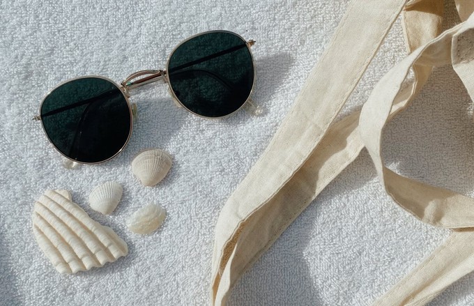 Sustainable sunglasses on the sand