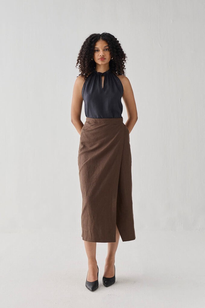 Woman wearing a sustainable midi skirt