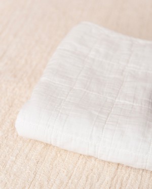 BENTO Organic Cotton Quilted Baby Blanket In Off White from Beaumont Organic