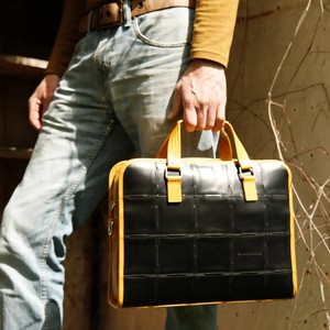 Compact Briefcase | Leather & Fire-hose from Elvis & Kresse