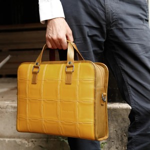 Compact Briefcase | Leather & Fire-hose from Elvis & Kresse