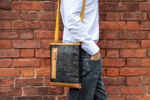 Reporter Bag | Leather & Fire-hose from Elvis & Kresse