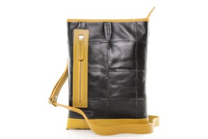 Reporter Bag | Leather & Fire-hose from Elvis & Kresse