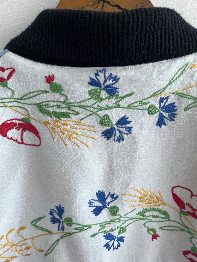 The “WILDFLOWERS” Upcycled statement collar floral embroidered Cardigan from Fitolojio Workshop