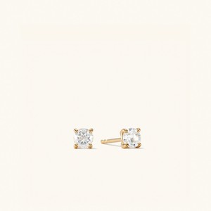 Round Topaz Studs from Mejuri