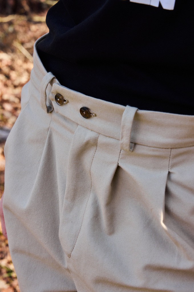 Beige over-the-knee pants from NWHR