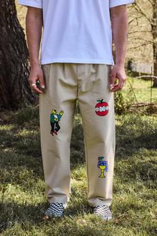Beige over-the-knee pants via NWHR