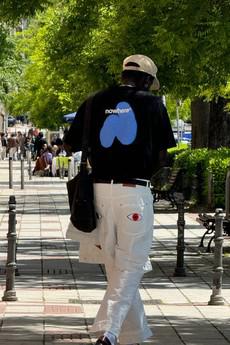 Hope Heals pleated trousers via NWHR