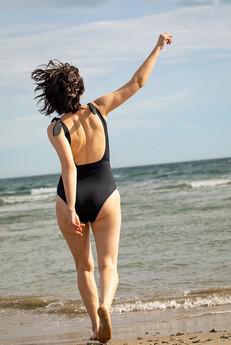 One-piece Aegean black from Olly