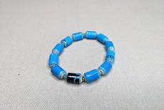 Bracelet made of cylindrical paper beads "Kribi" via PEARLS OF AFRICA