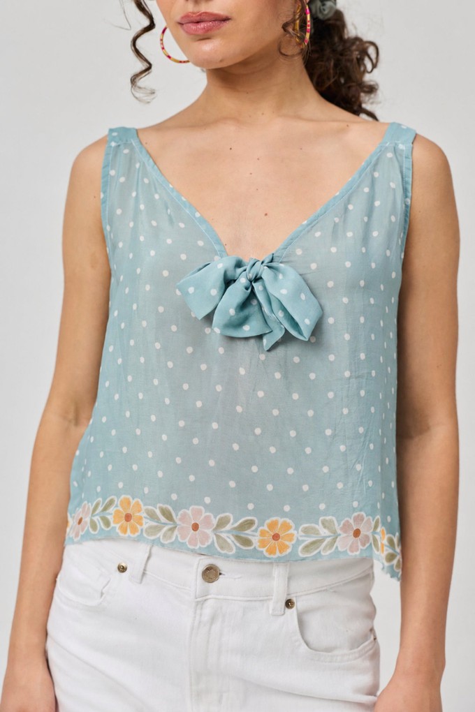 Deep V-Neck Polka Dot Top with Bow Detail from Reistor
