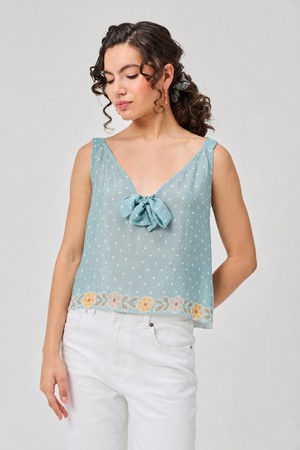 Deep V-Neck Polka Dot Top with Bow Detail from Reistor