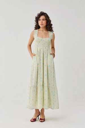 The Smocked Maxi Dress in Yellow Florals from Reistor