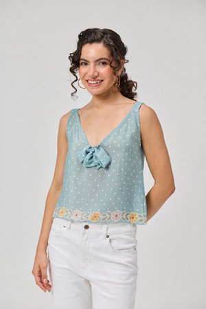 Deep V-Neck Polka Dot Top with Bow Detail from Reistor