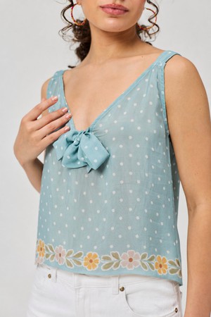 Deep V-Neck Polka Dot Top with Bow Detail from Reistor