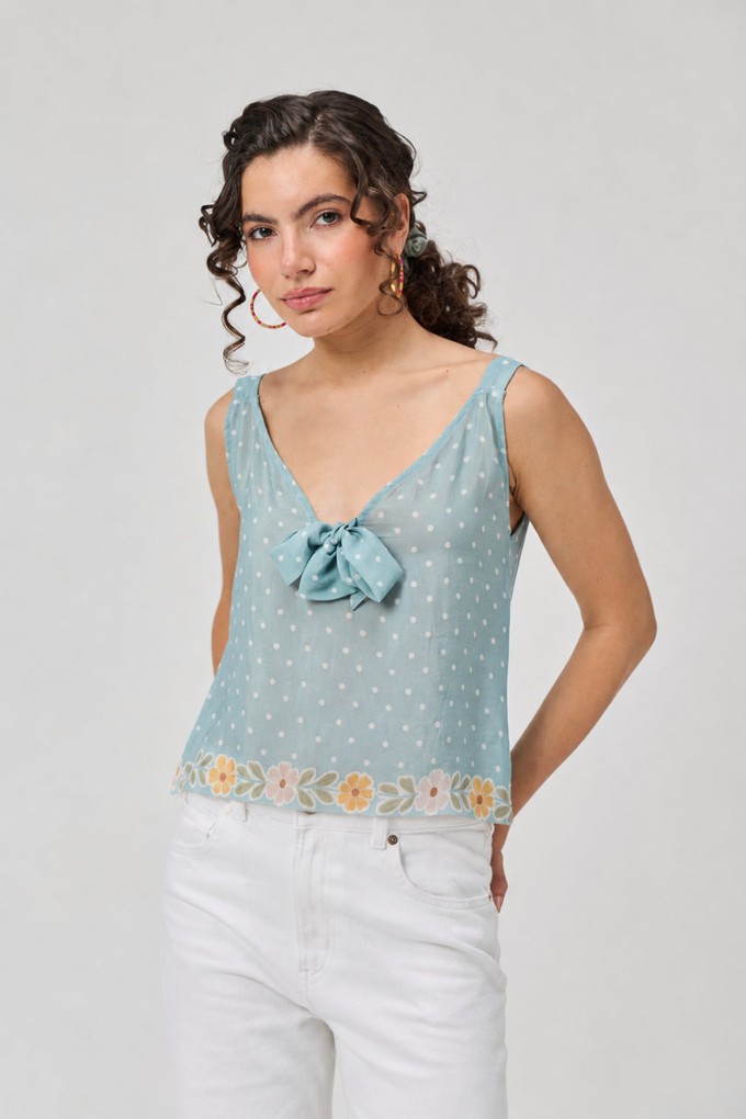 Deep V-Neck Polka Dot Top with Bow Detail from Reistor