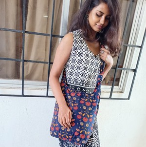 Vibrant crossbody sling handbag with knotted strap from Shakti.ism