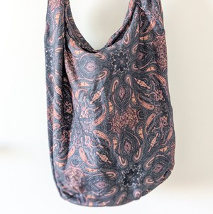 Vibrant crossbody sling handbag with knotted strap from Shakti.ism