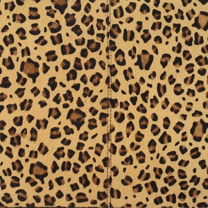 Animal Print Convertible Leather Backpack from Sostter