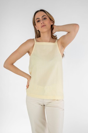 Light top with thin yellow straps from STORY OF MINE